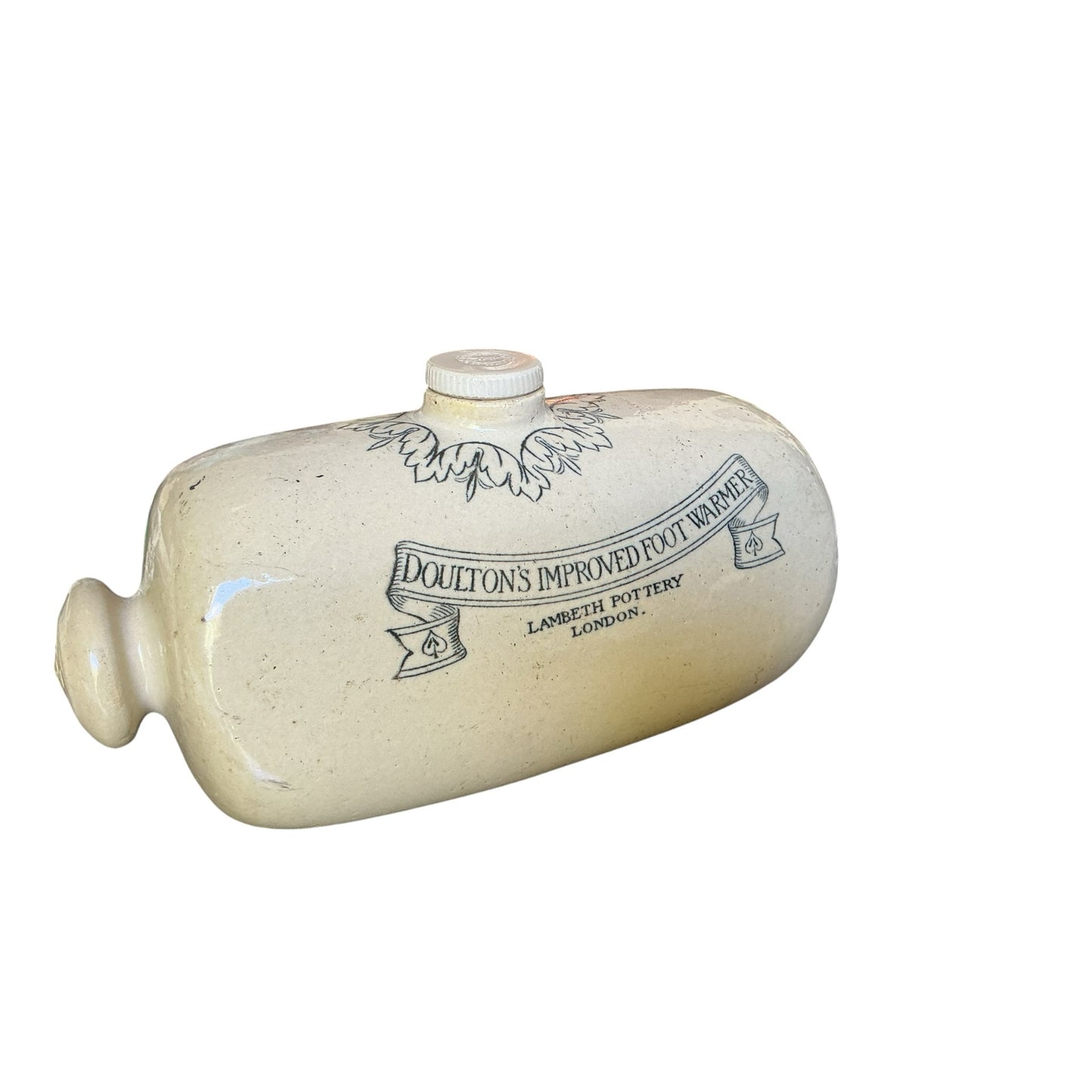 Otoch antique cream glazed Doulton Lambeth stoneware foot warmer with vintage transfer print and scrollwork detail.