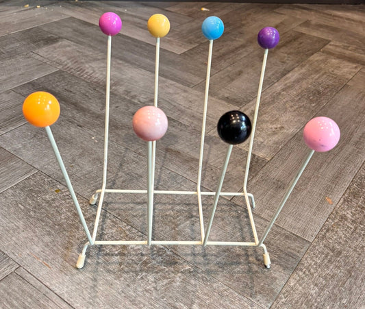 Vintage multi colour magazine rack