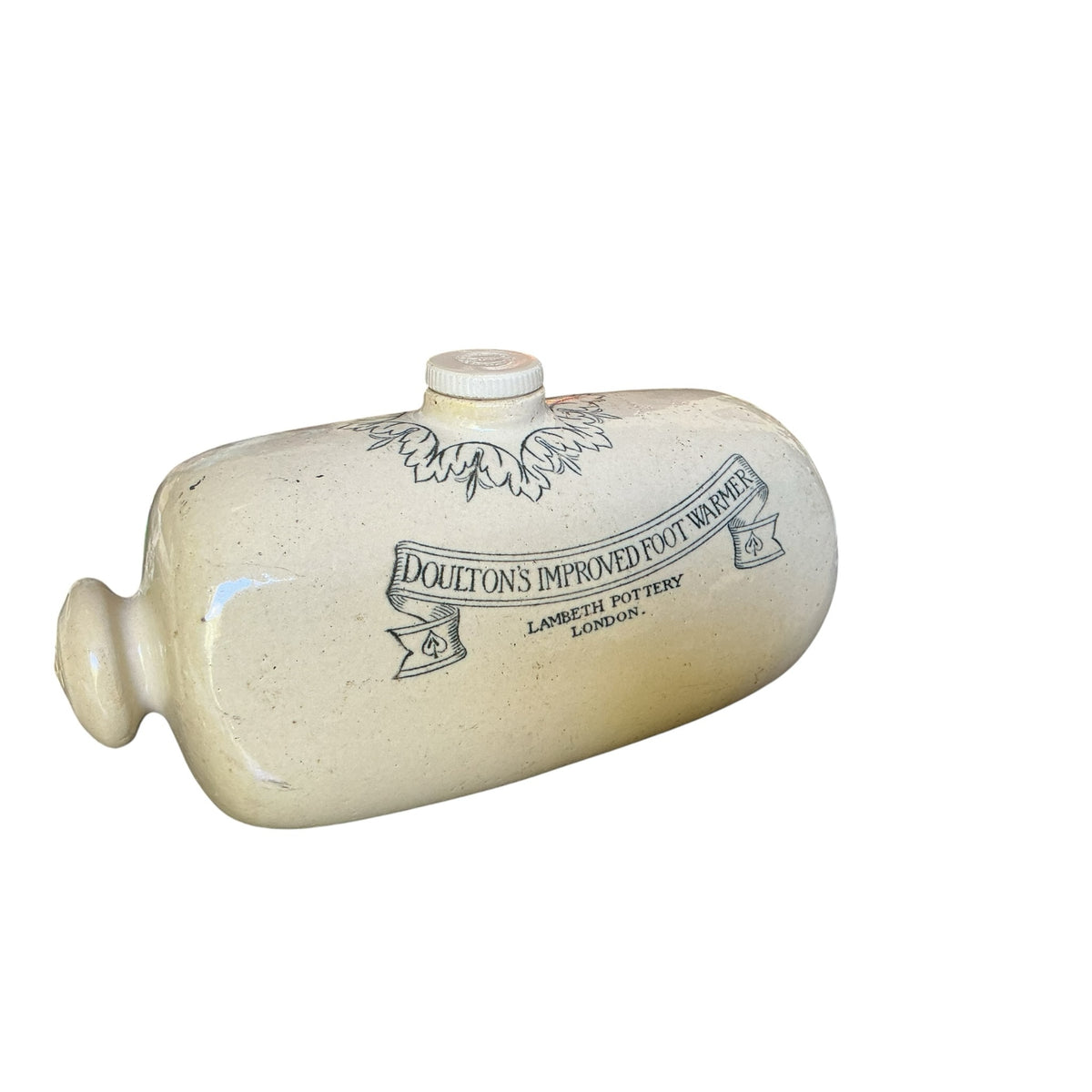 Otoch antique cream glazed Doulton Lambeth stoneware foot warmer with vintage transfer print and scrollwork detail.