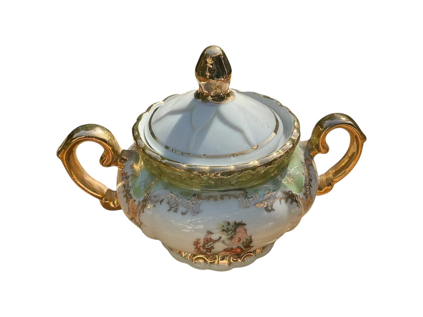 Otoch porcelain sugar bowl with gold accents and hand-painted scene, part of a vintage tea set.