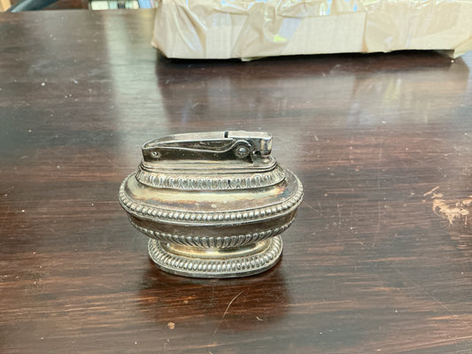 Otoch vintage silver-plated Ronson Queen Anne table lighter with intricate gadrooned detailing and classic oval shape.