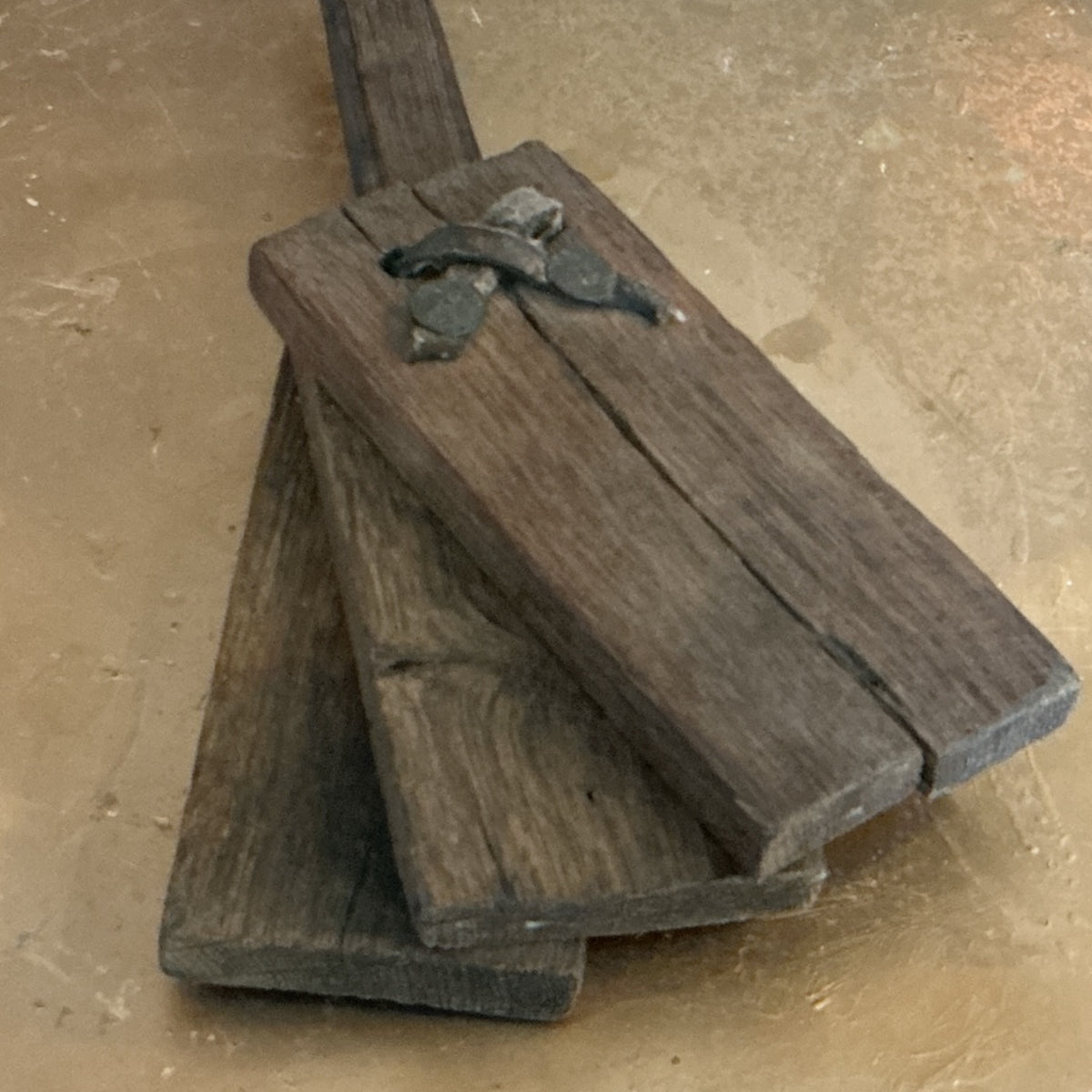 Otoch handcrafted rustic wooden clapper made from weathered reclaimed timber with industrial metal detailing.
