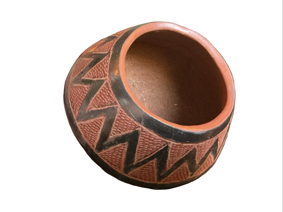 Otoch handcrafted terracotta nesting bowl with textured surface and metallic black zigzag geometric pattern