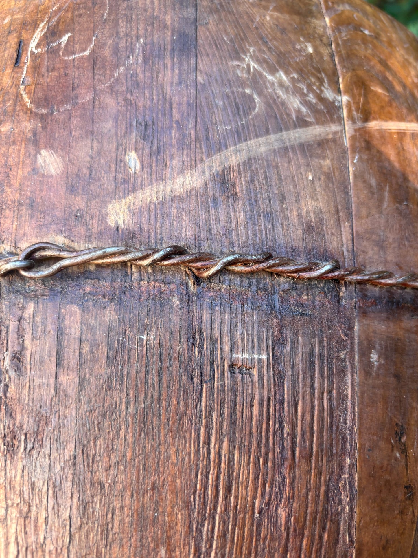 Close-up of an Otoch vintage wooden bucket featuring dark weathered wood grain and twisted metal wire detailing.