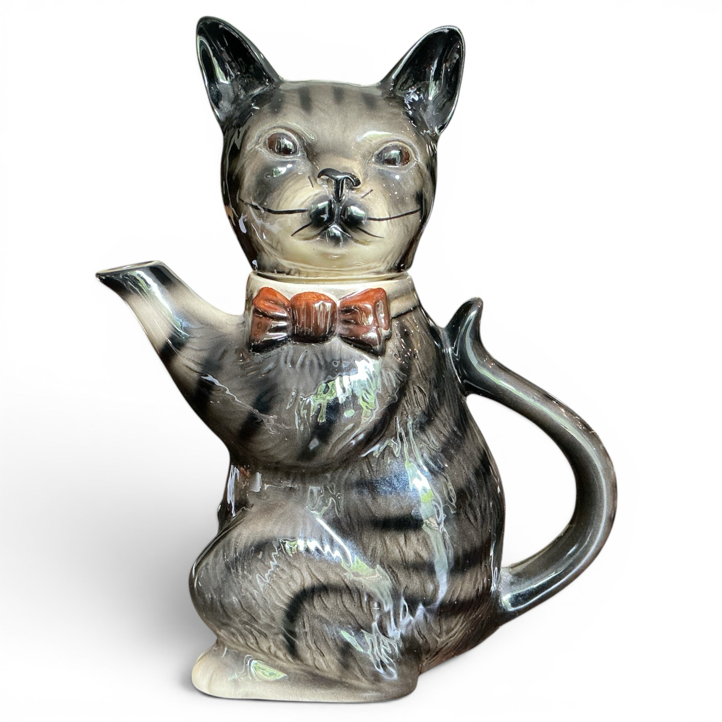 Otoch Long John Silver Pussy Foot Cat Teapot, ceramic tabby cat with red bow tie, detailed fur markings, expressive eyes, functional and decorative.
